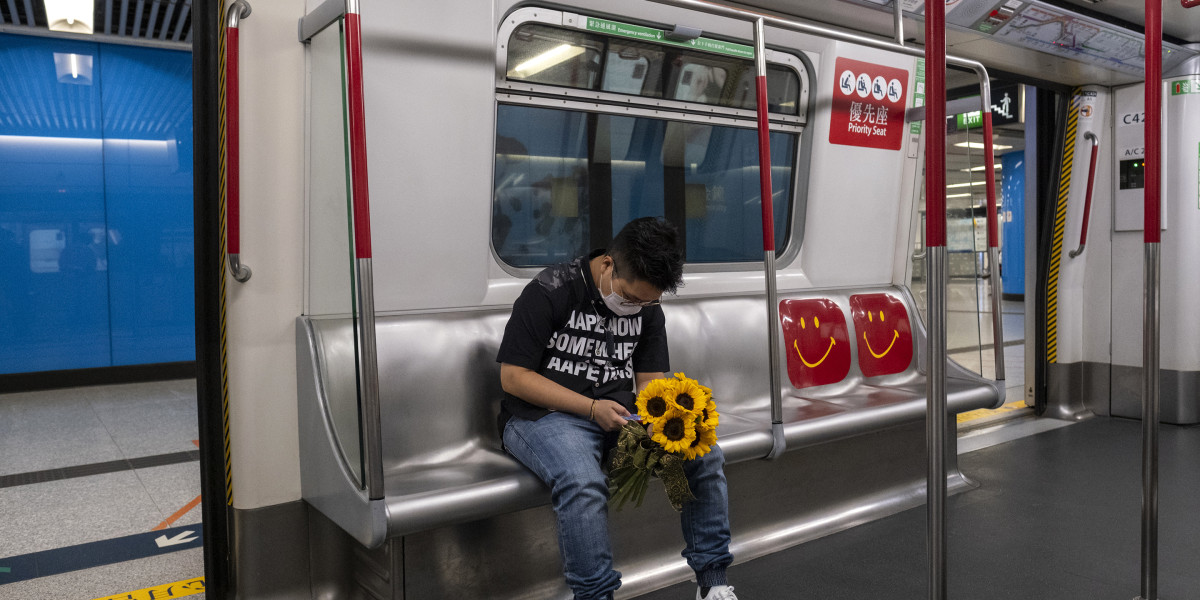Hong Kong’s famed subway reeling from protests, virus Outbreak